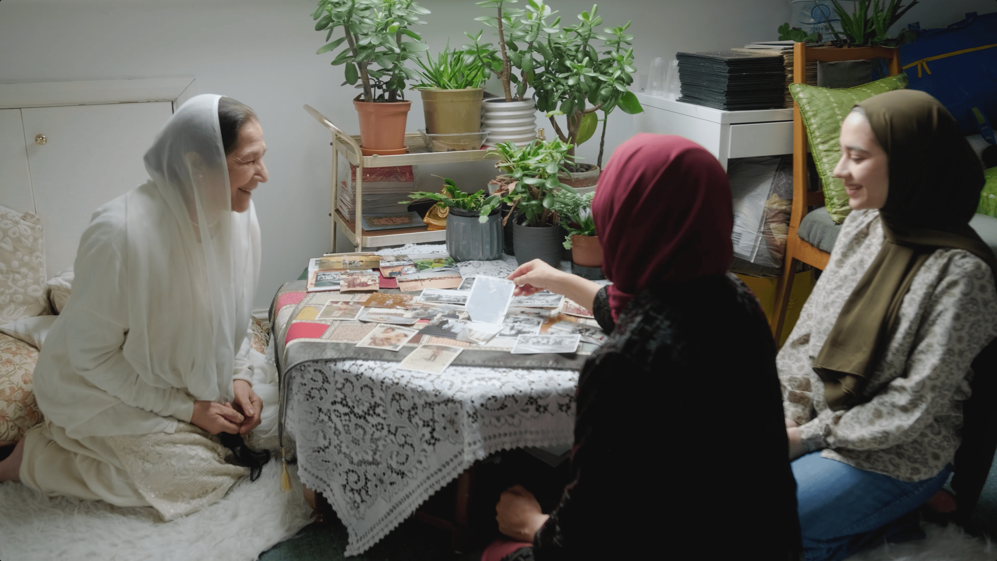group of women looking at photo album